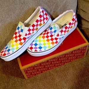 Vans “off the wall” rainbow slip-ons. Canvas.